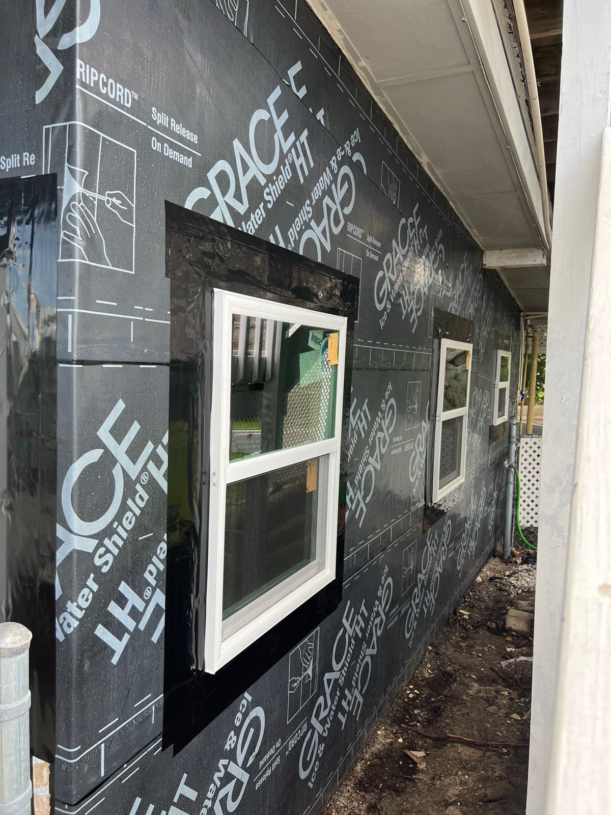 Exterior window installation with water barrier in Tampa