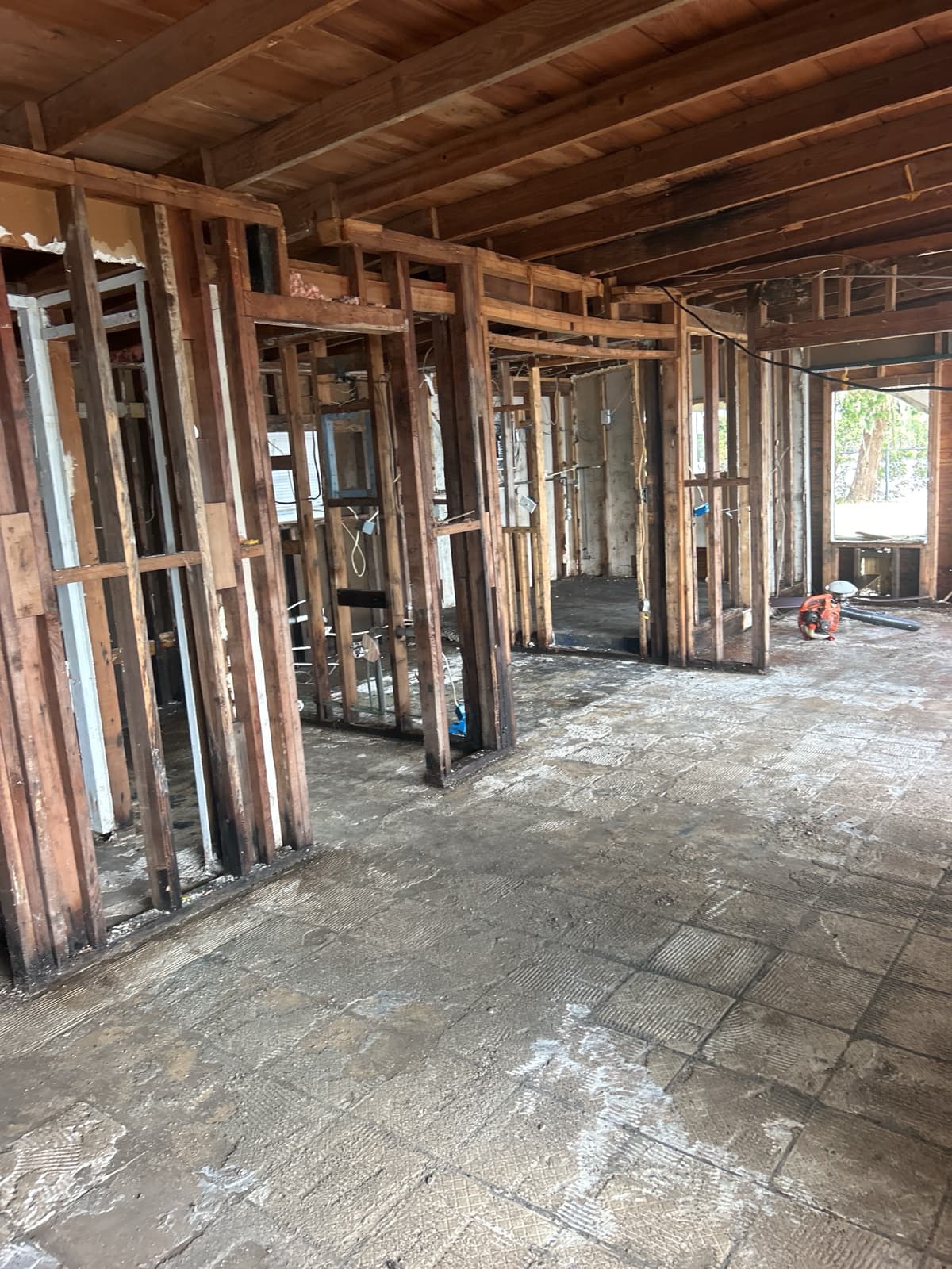 Flood restoration interior framing after gutting in Tampa